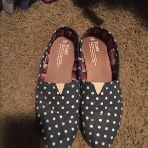 Navy and cream Toms.